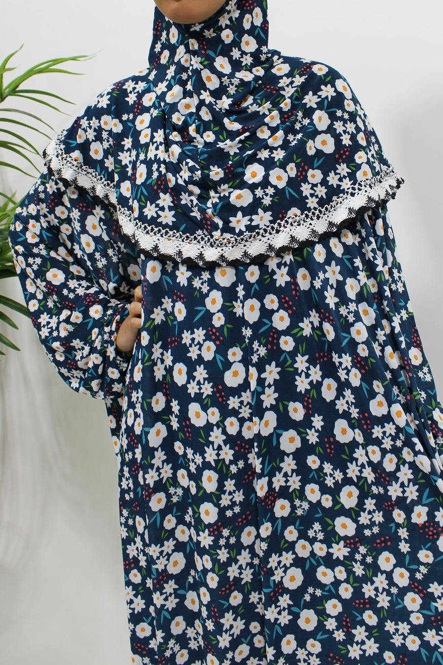 Navy floral slip-on jersey prayer dress with attached hijab, front view