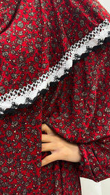 Red floral slip-on jersey prayer dress with attached hijab, front view