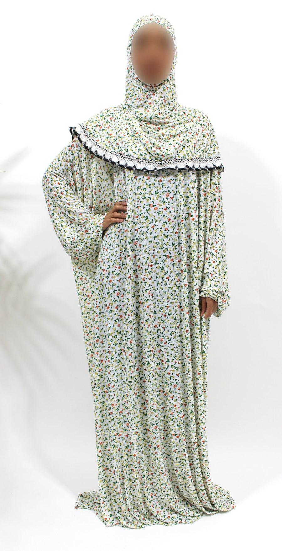 White floral jersey prayer dress showing the attached hijab