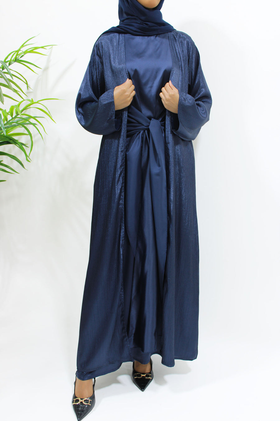 Full-length view of the navy shimmer open abaya set