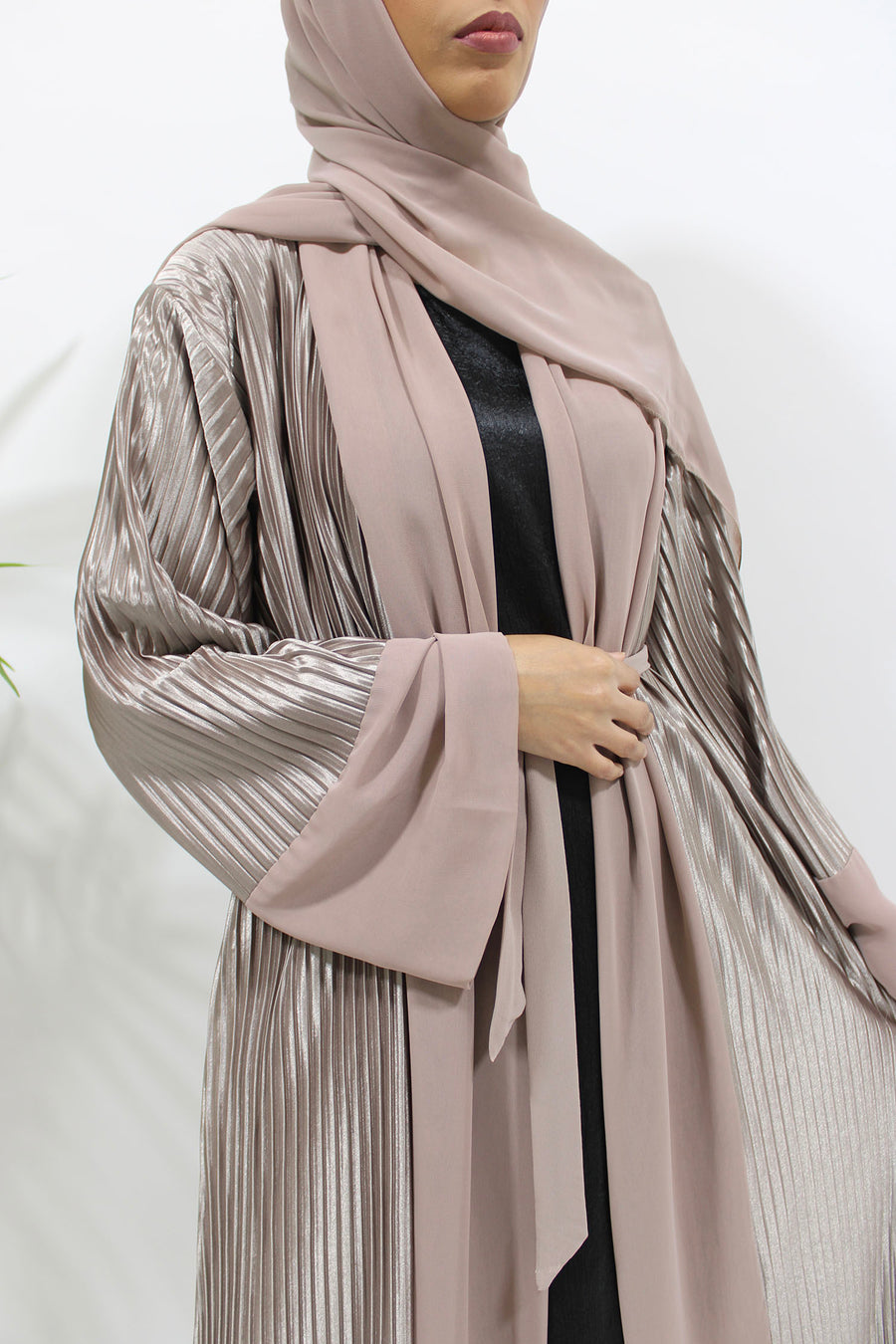 Pink nude pleated open abaya belted at the waist for a defined silhouette