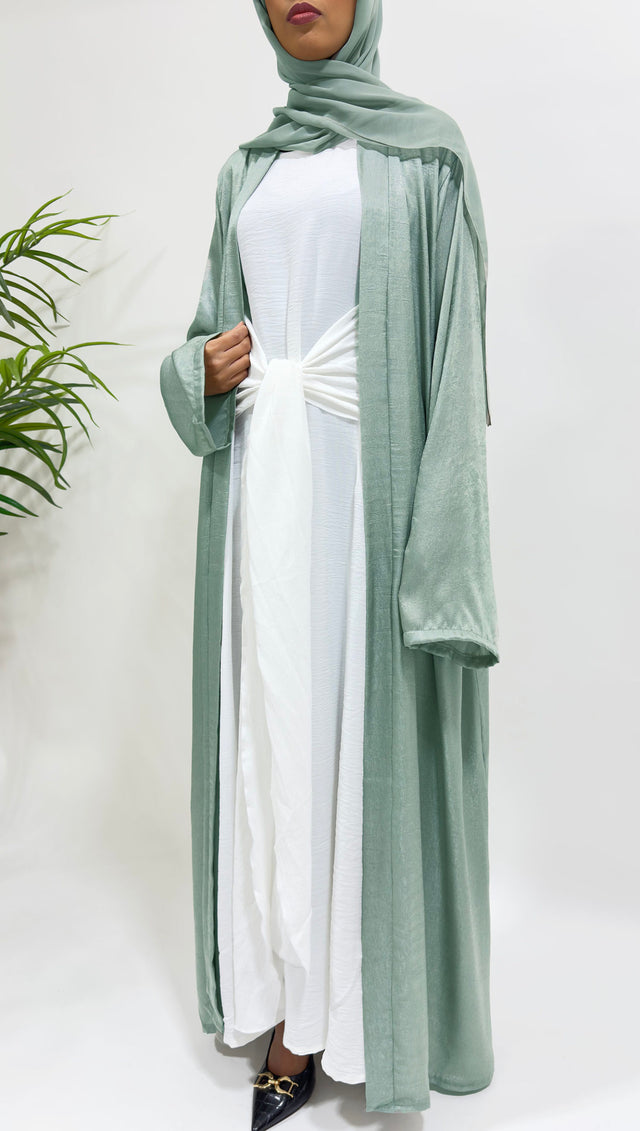 Sage green three-piece open abaya set with white inner dress and matching hijab