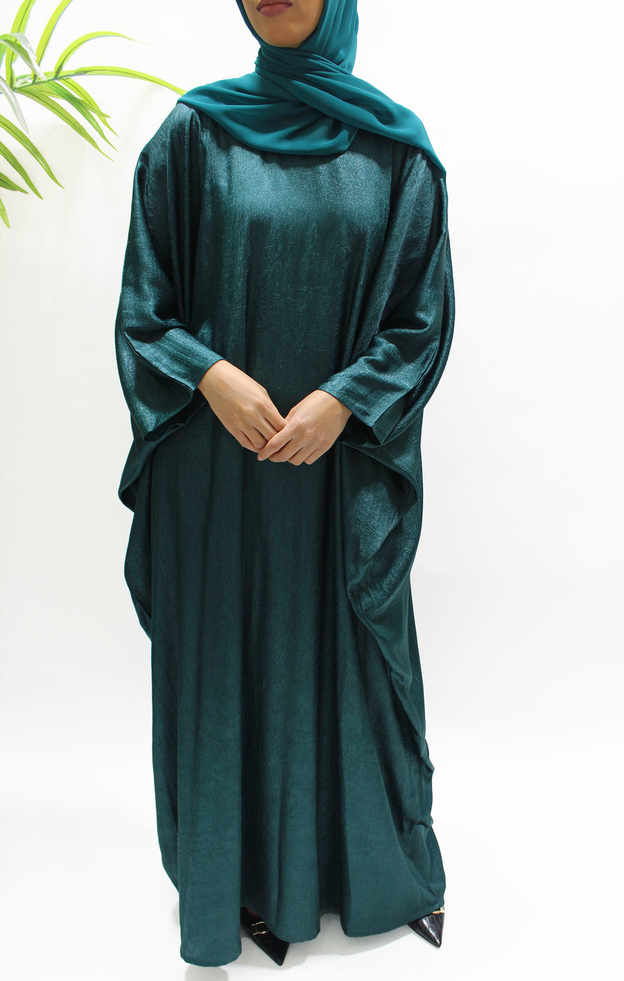 Teal farasha closed abaya shown front-on with matching hijab