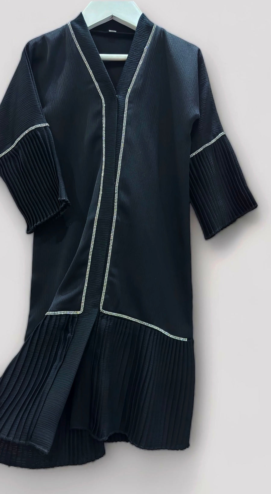 Silver embellishment and pleated detail on the toddler open abaya