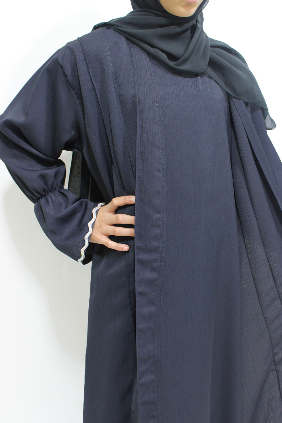 Embellished cuff detail on the dark grey girls' open abaya