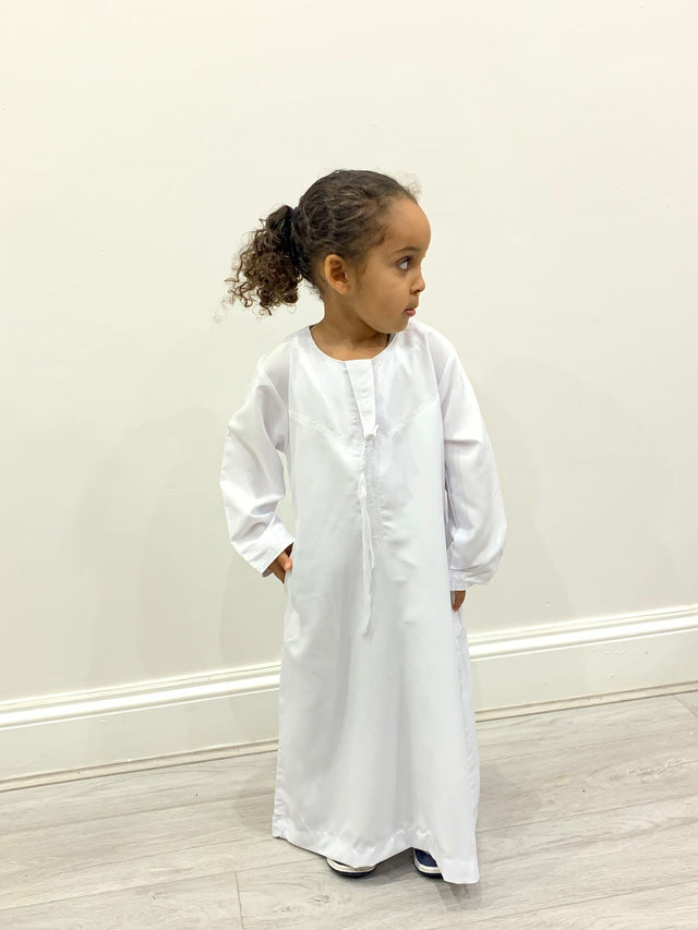 Boys white Emirati thobe with round neckline, front view
