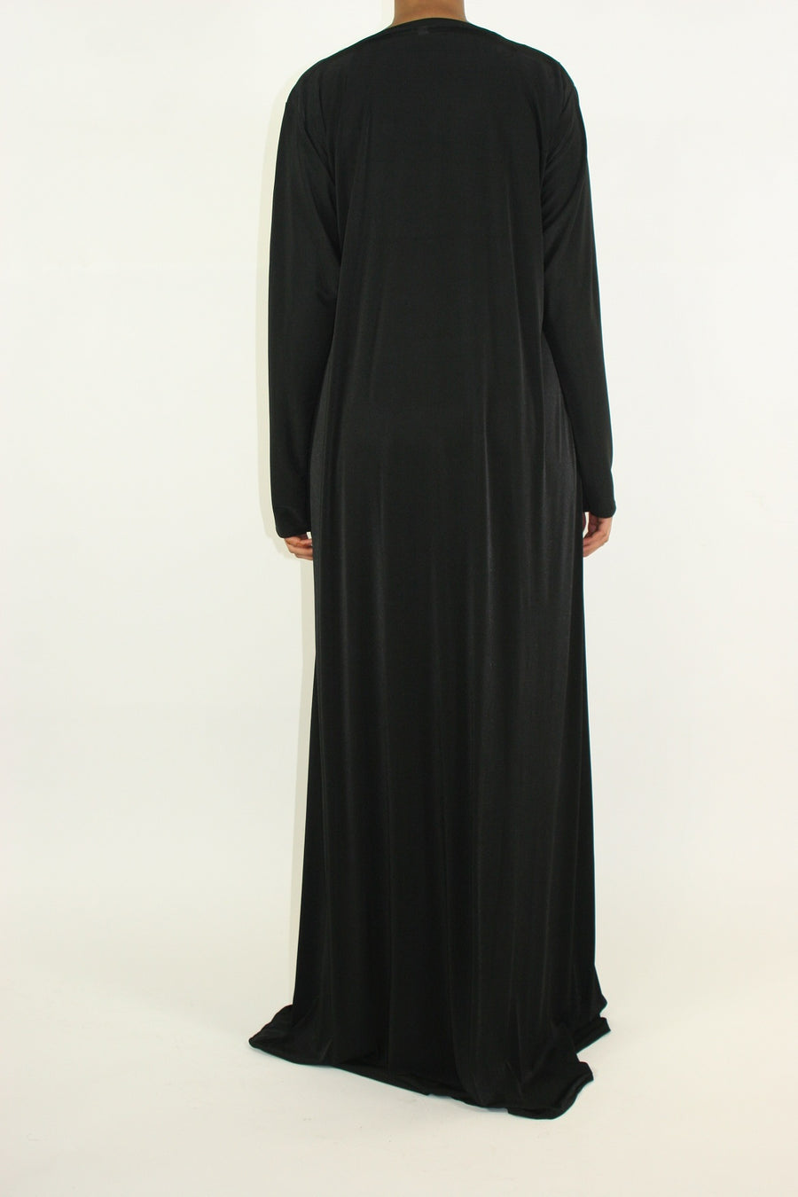 Full-length view of the black and burgundy paisley jersey abaya