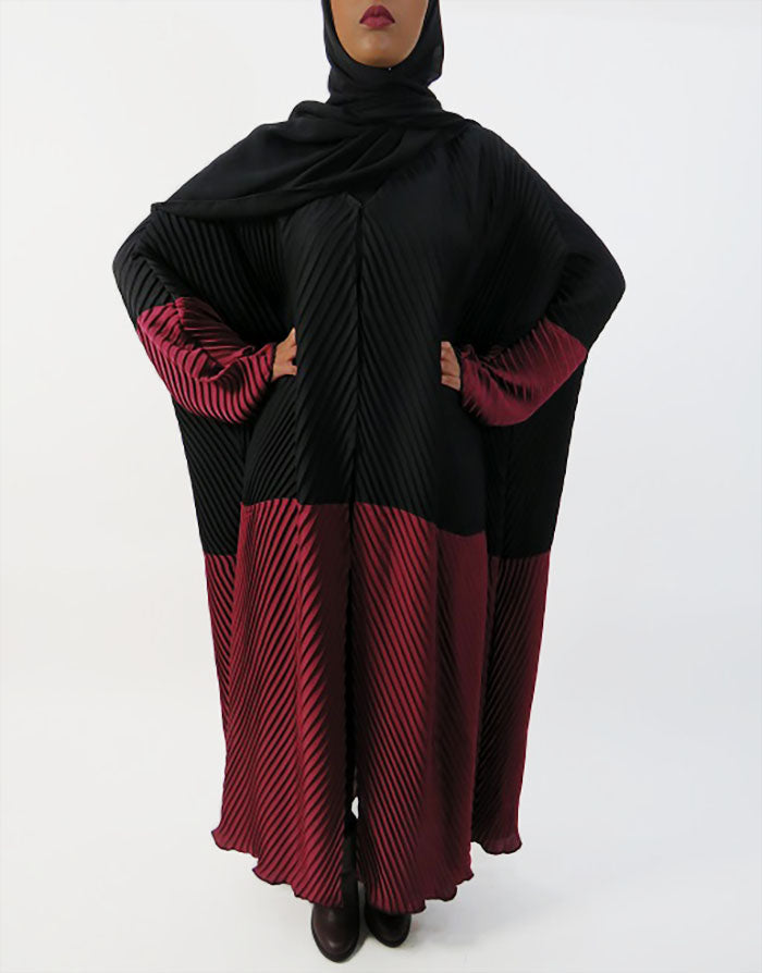 Black and burgundy pleated abaya showing batwing sleeves