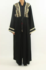 Black and gold two-piece trouser abaya set, front view