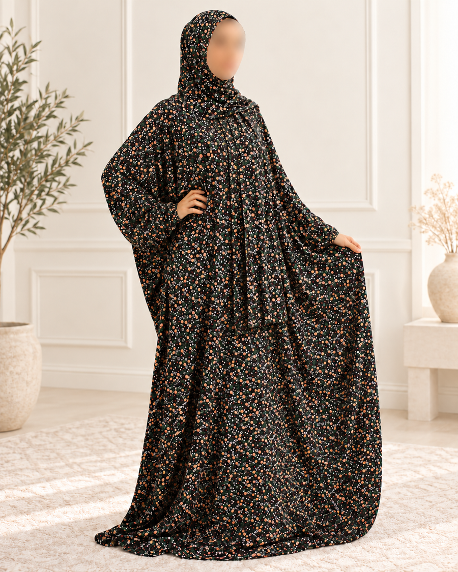 Black peach and green mini-floral prayer dress, angled full-length view showing generous drape and plain fabric edges