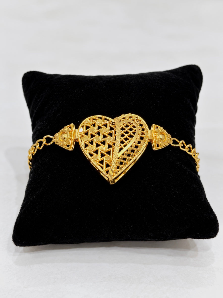 Gold-tone heart motif bracelet