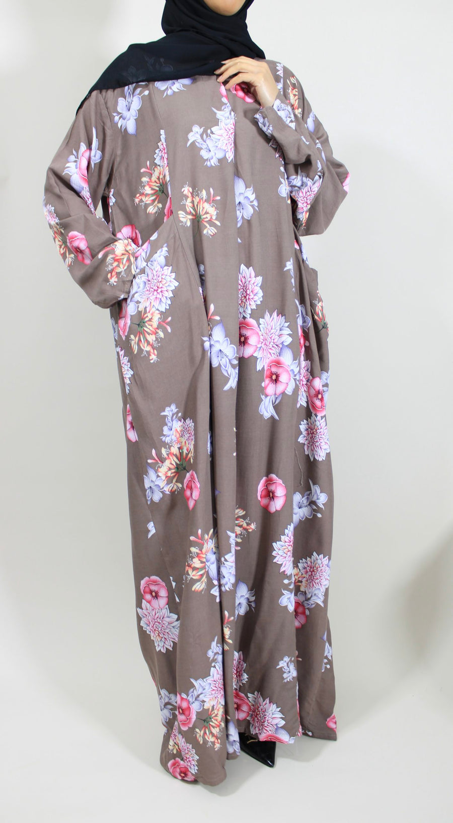 Floral print and pocket detail on the taupe modest maxi dress