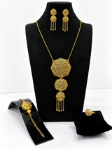 Gold-tone octagon starburst jewellery set with necklace earrings bracelet and ring