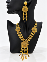 Gold-tone sunburst medallion necklace with matching drop earrings
