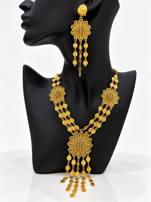 Gold-tone sunburst medallion necklace with matching drop earrings