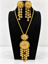 Gold-tone twin rosette necklace with matching long drop earrings